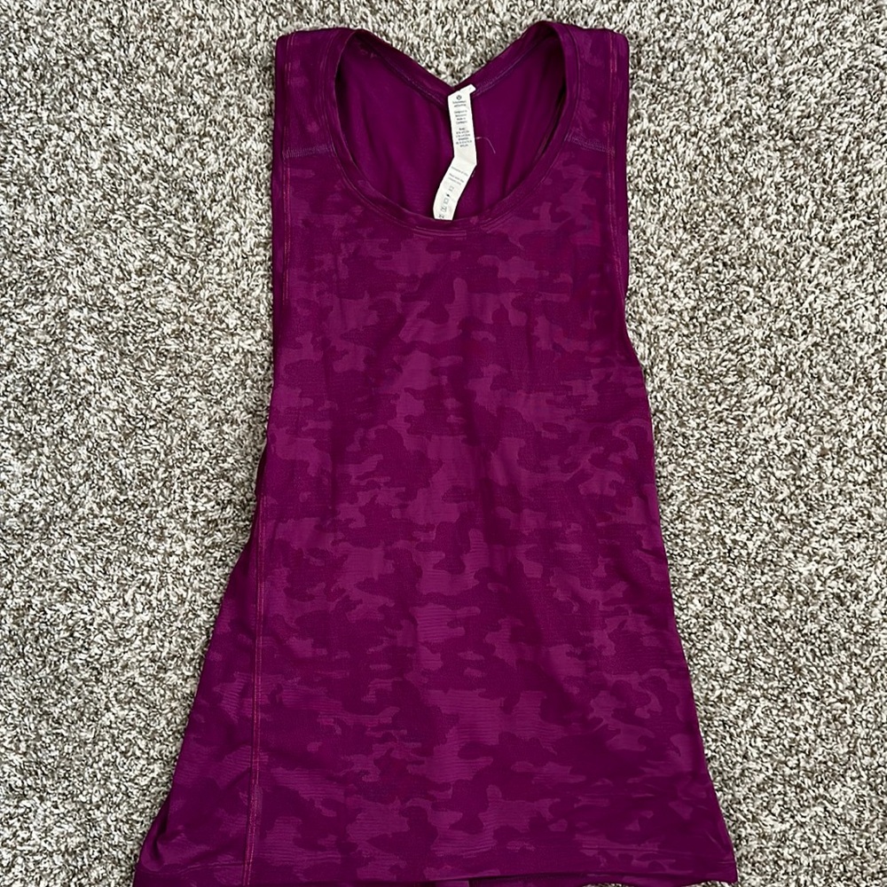 Cleaning out closet. lululemon tank top. Size 4